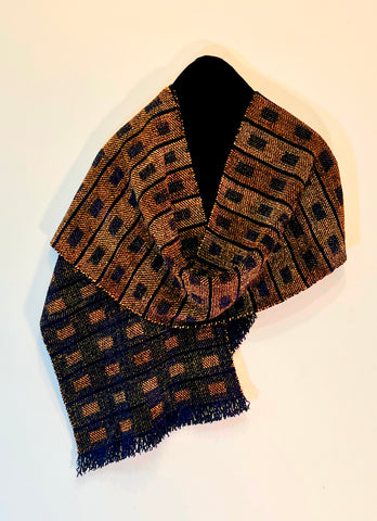 Gold and bronze scarf with black rectangles spaced apart